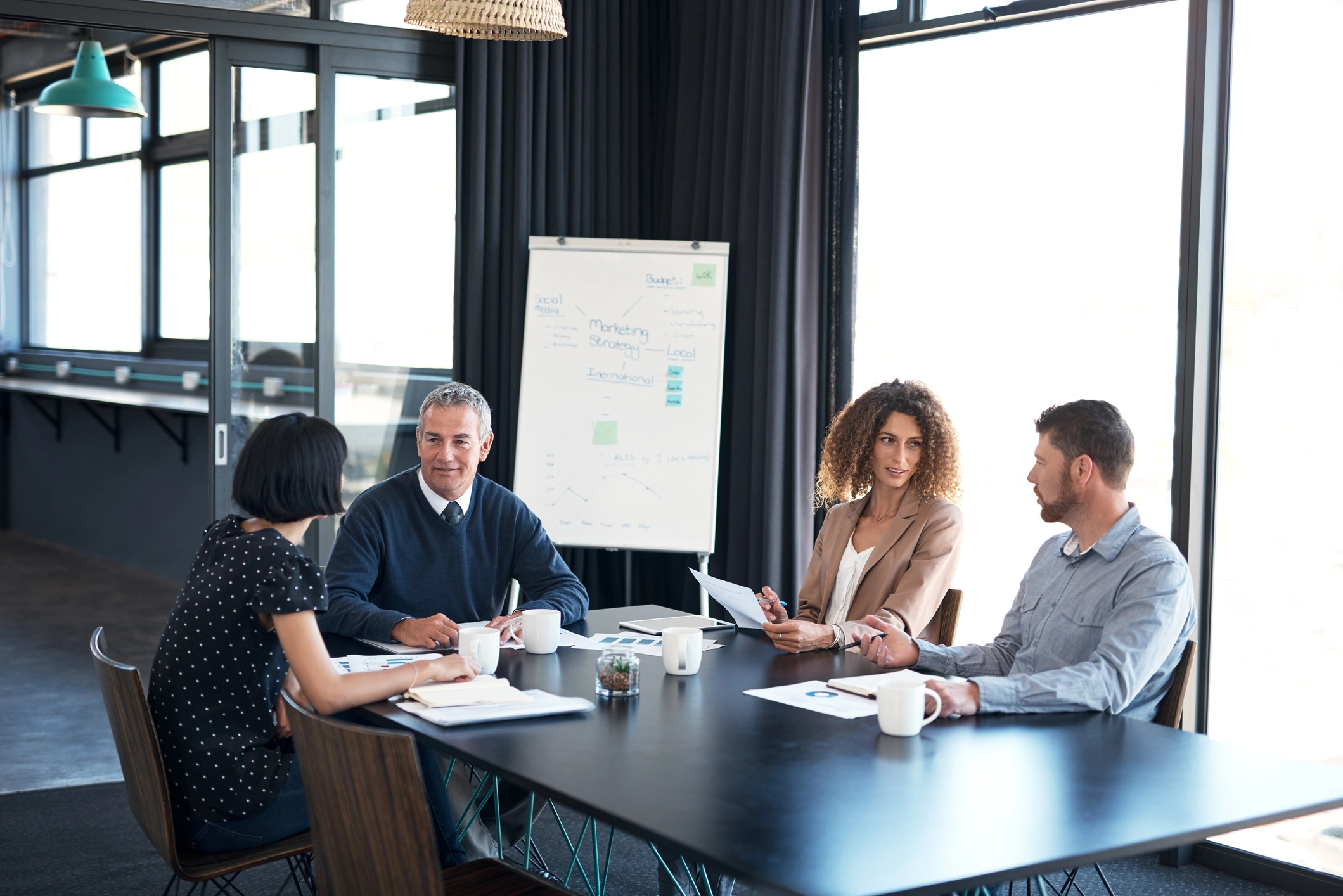 Business professionals collaborating on marketing strategy