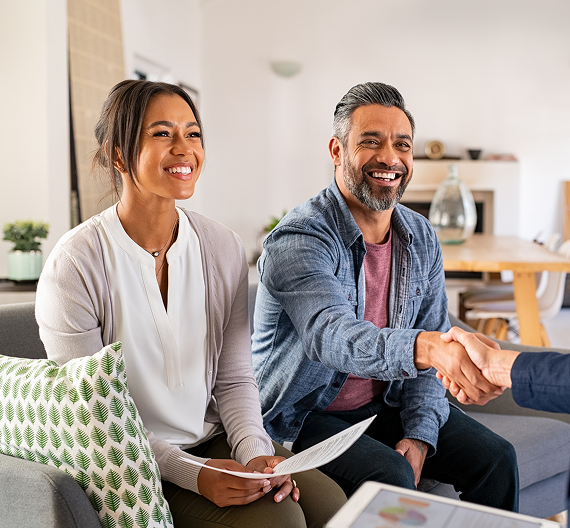 Clients meeting with a professional during a business consultation