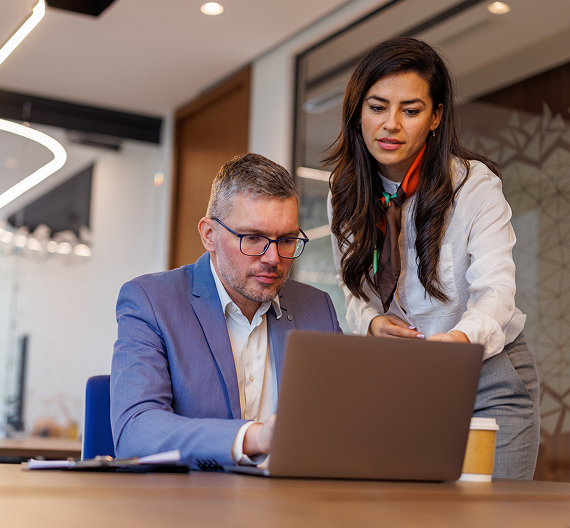 Professionals working together on business tasks