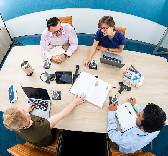 Business team discussing documents during a meeting