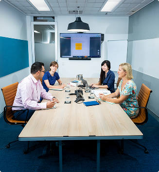 Professional team collaborating during a meeting in a conference room